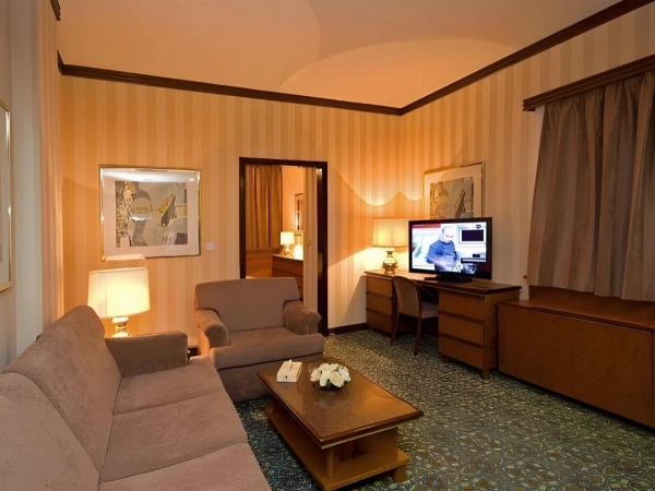 Suite with TV and seating Jeddah Rooms