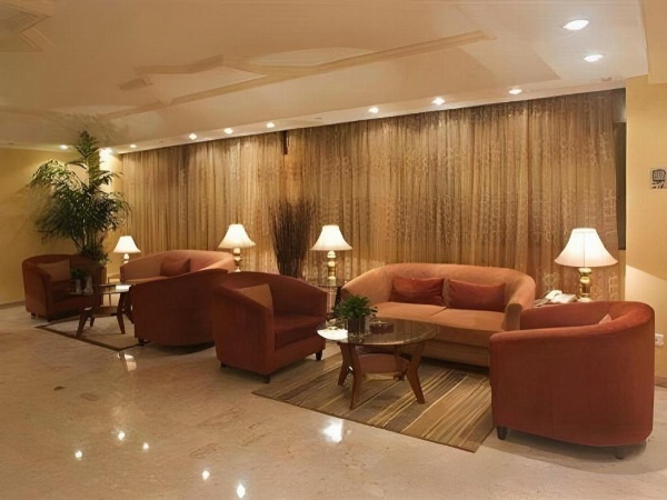Lobby with gold curtains Jeddah Rooms